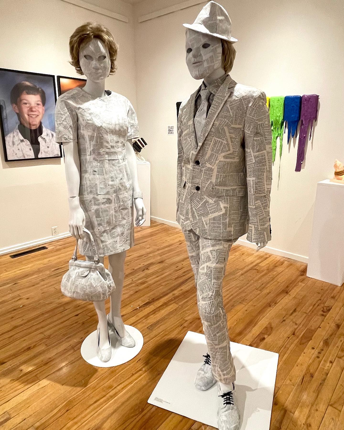 human figures made of papier maché made from bible pages
